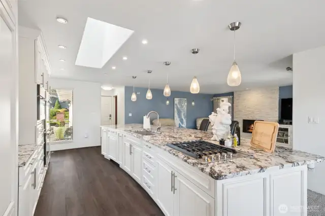 - and around the corner is the expansive, fully updated chef's kitchen-galore!