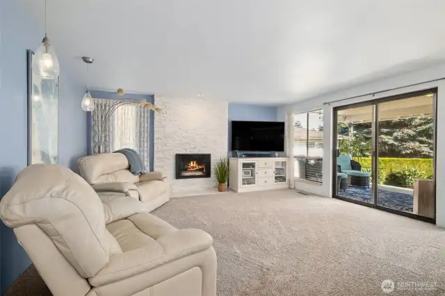 Your hang out destination - the family room off the kitchen! Includes new brick fireplace surround, marble hearth & zero clearance gas fireplace with heat pump.