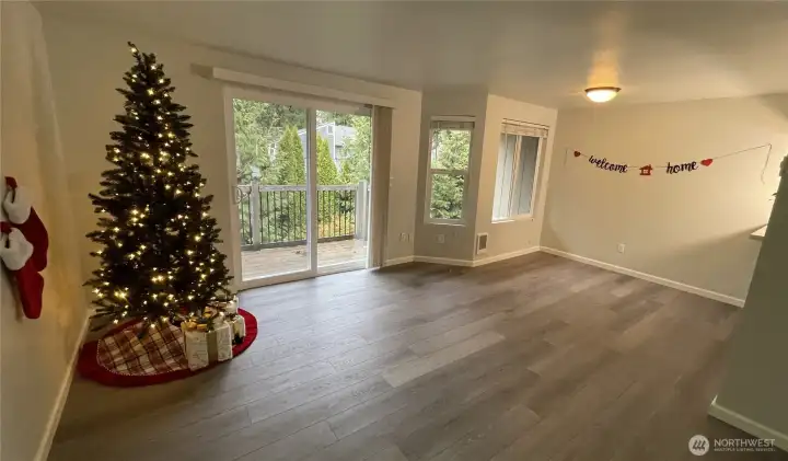 Current open-concept living and dining rooms