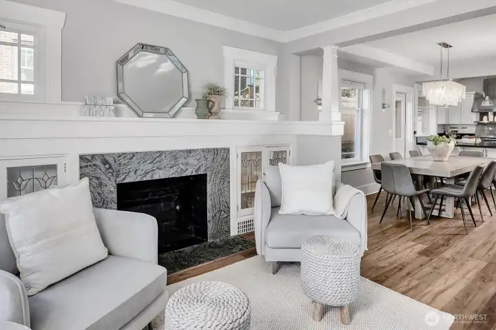 Living area open to the dining room and kitchen beyond