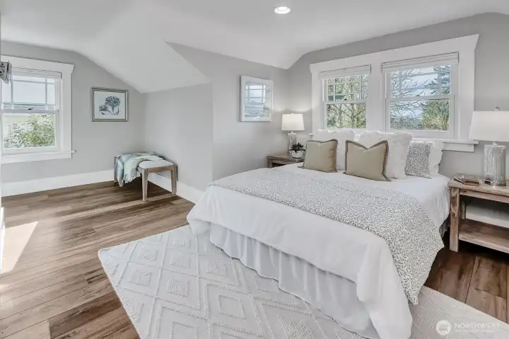 Primary bedroom with walk-in closet