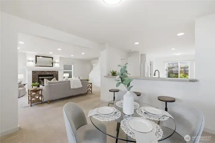 Dining area + kitchen (staged)