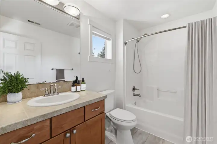 Second bathroom - upper level (virtually staged)