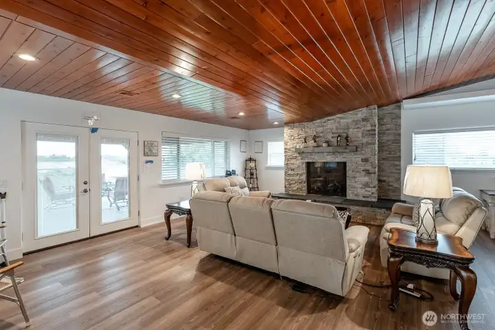 Upstairs living room with entry to deck
