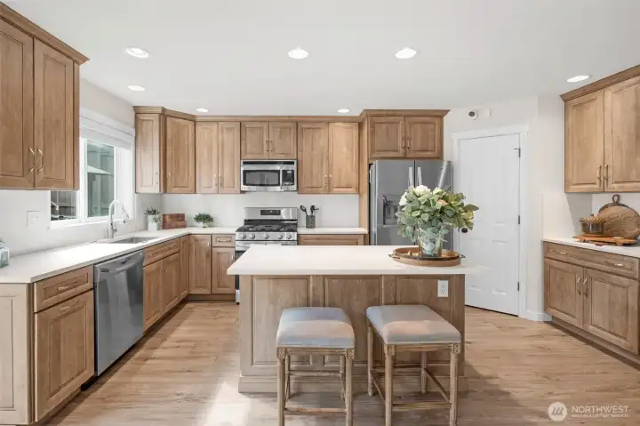 Bright Kitchen with quartz countertops.