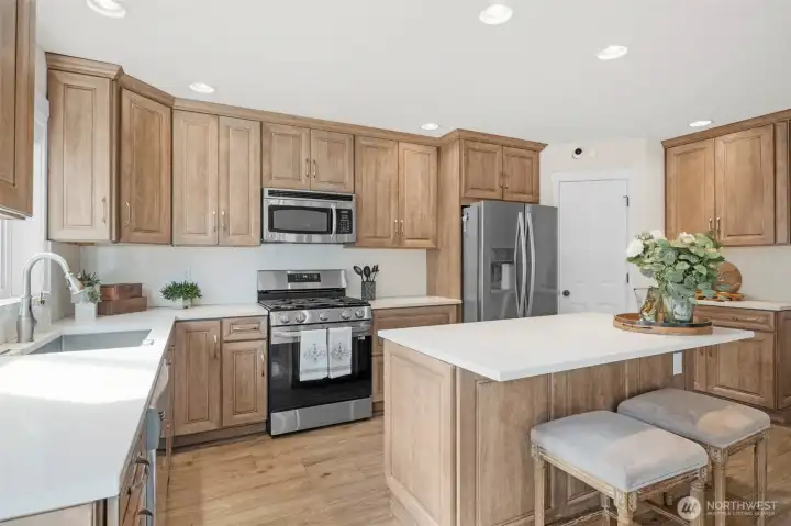 Bright Kitchen with quartz countertops.