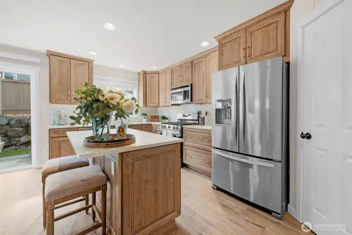Bright Kitchen with quartz countertops.