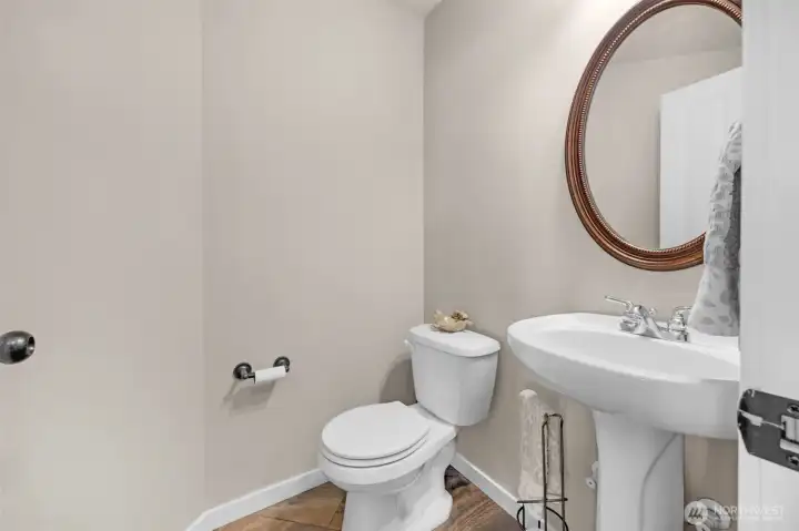 Downstairs half bathroom.