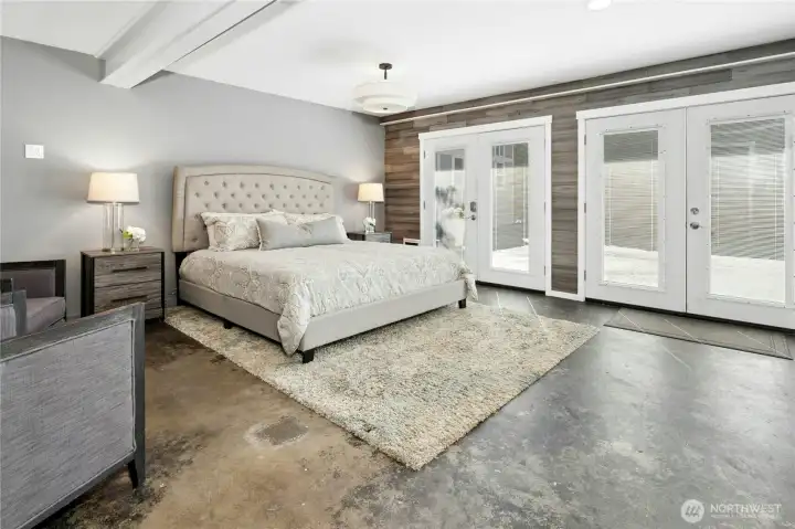 Lower level expansive bedroom with french doors