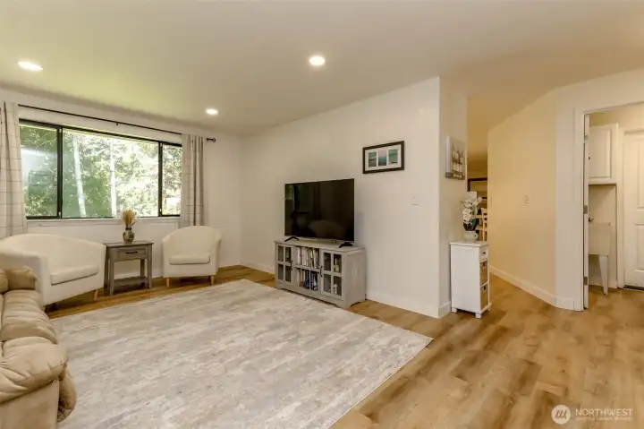 This angle better shows the utility room off the entry to the home and kitchen entry.