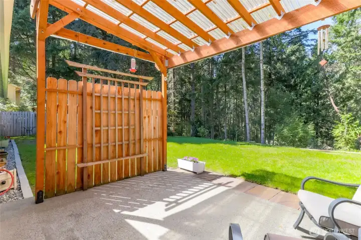 Retractable awning for added shade when needed at the end of this covered patio.