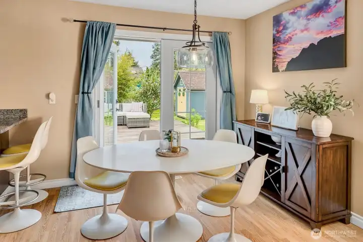 Dining room has french doors to huge deck!