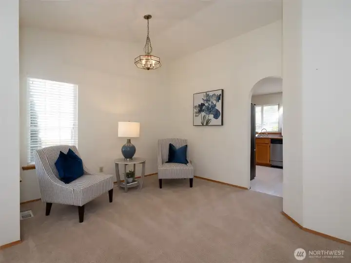 This sitting nook can also be a formal dining space.  Or your private library?