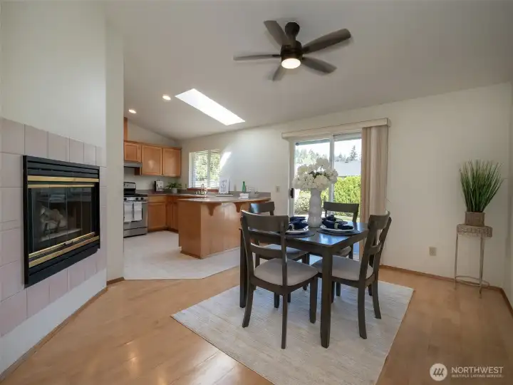 The vaulted ceiling and hardwood floors plus a convenient ceiling fan.