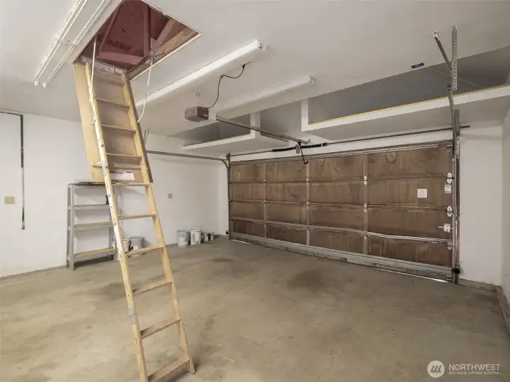 So much storage in the garage above the door and in the lighted attic.