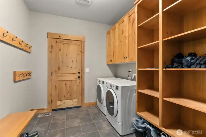 Utility room and garage entry w/ room for boots and gear