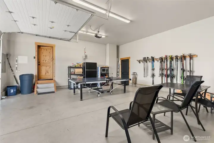 Garage with space for vehicles, toys, or rec space