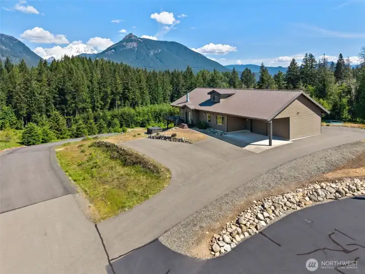 Garage, carport and surrounding paved area parking