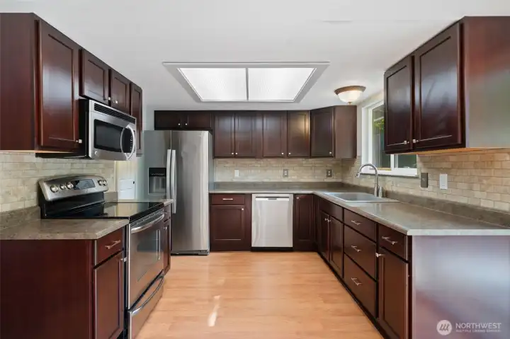 Huge kitchen with lots of storage and newer cabinets and appliances. Huge kitchen with lots of storage and newer cabinets and appliances.