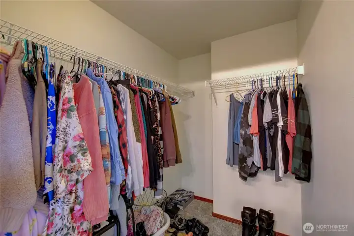 Primary Walk-In Closet - Upper Level Primary Walk-In Closet - Upper Level