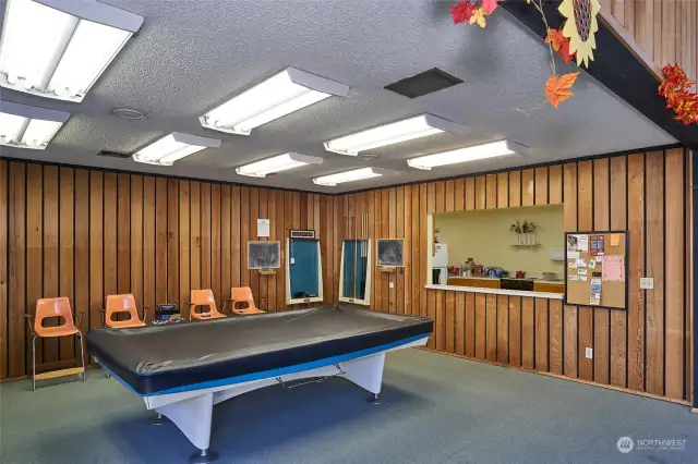 Community Club House with pool table and kitchen.