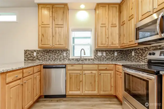 Excellent kitchen with natural wood cabinets