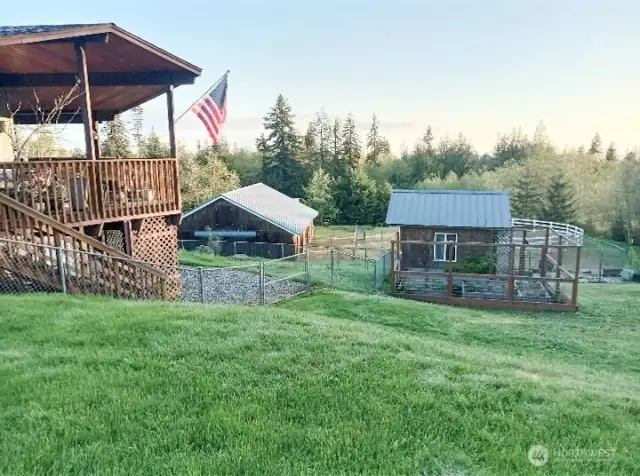 From Left to Right: Wraparound Deck, Stable, Chicken Coop