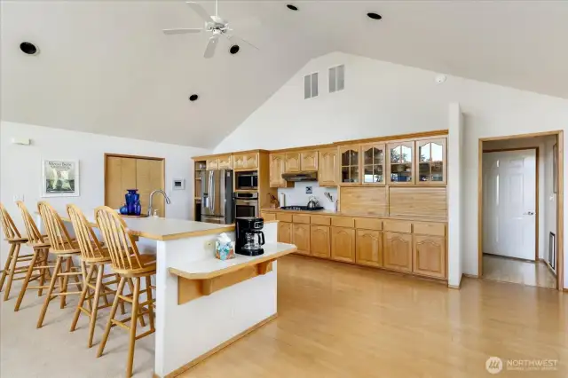 Pantry off of kitchen on left side of photo