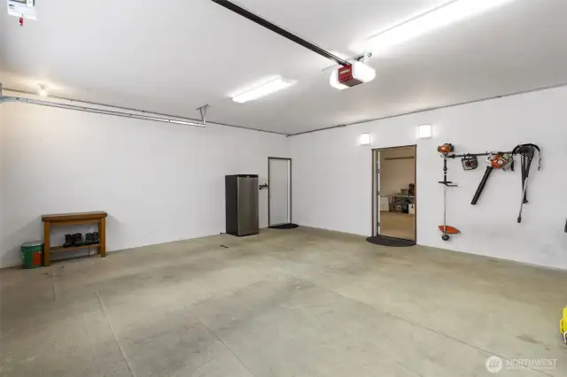 Spacious, spotless garage with wall storage and interior access.