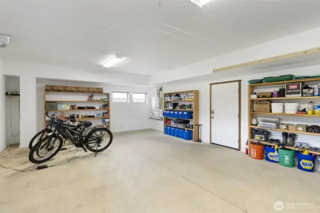 Bright workshop space with shelving, workstations, and plenty of room to create.