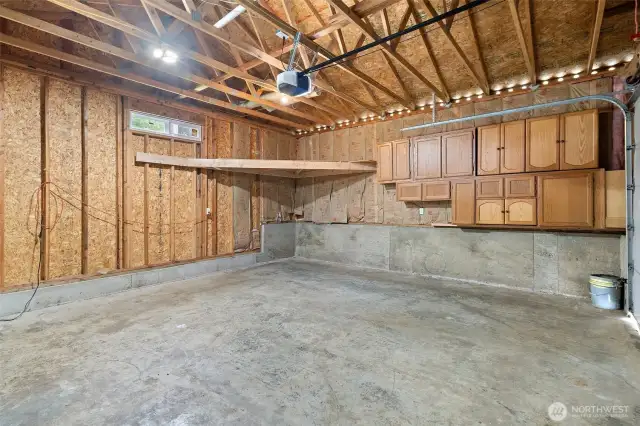 Huge garage with cabinets