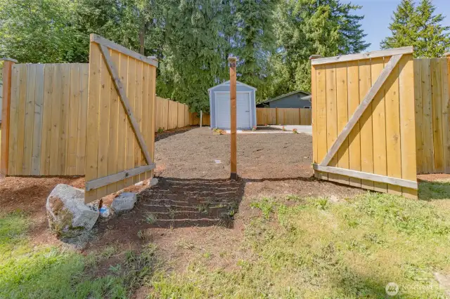 Access to the Backyard for Vehicles. Post can be removed for easy drive in.