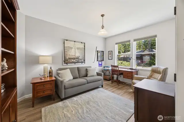 Large den is off the entry and very quiet and private -- could be a home office, and has plenty of room for a sleeper sofa.