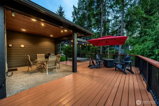 Twilight view of the patio and deck.