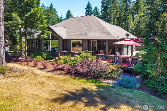 Backyard -- home has large picture windows throughout.
