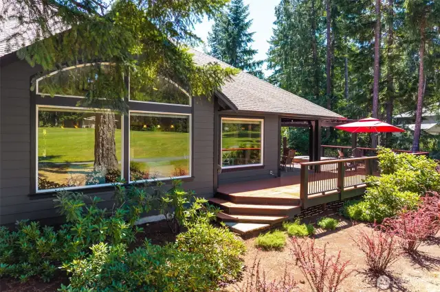 Very private deck, is adjacent to the fully landscaped side yard.