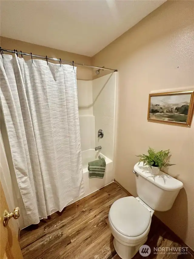 Hall bath shower and toilet.