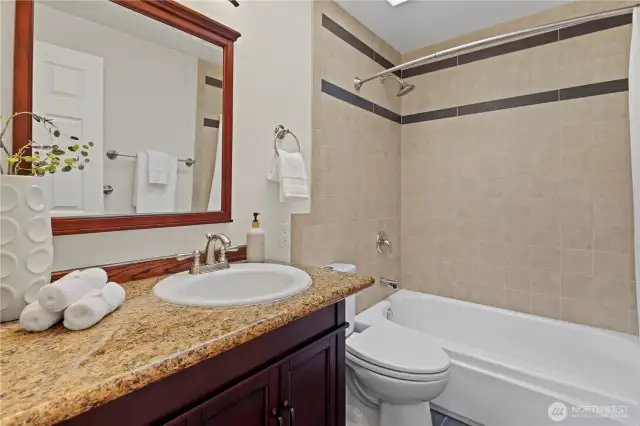 Main floor bathroom is ready for the new owners to create refreshed spaces of their own.