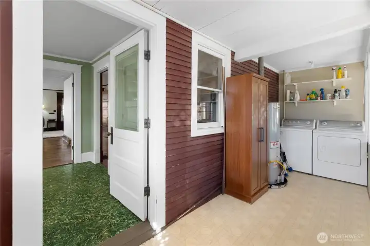 ~120 SQFT enclosed porch/laundry/mud room