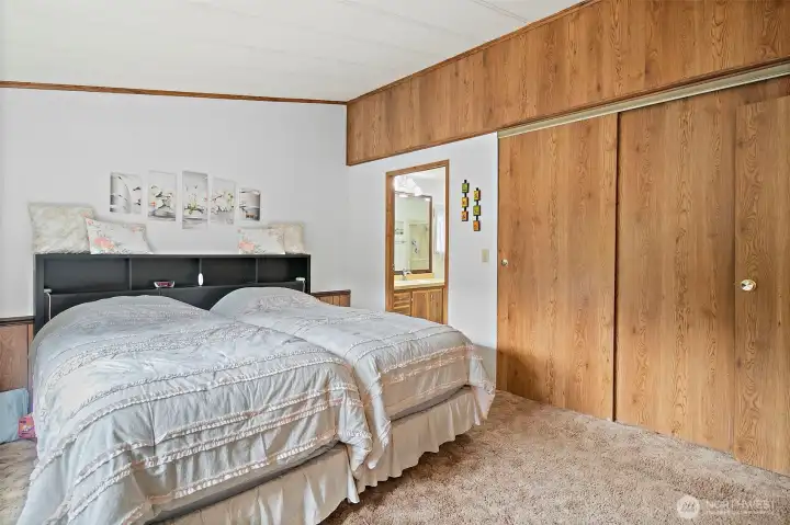 Huge walk in closet in primary bedroom.