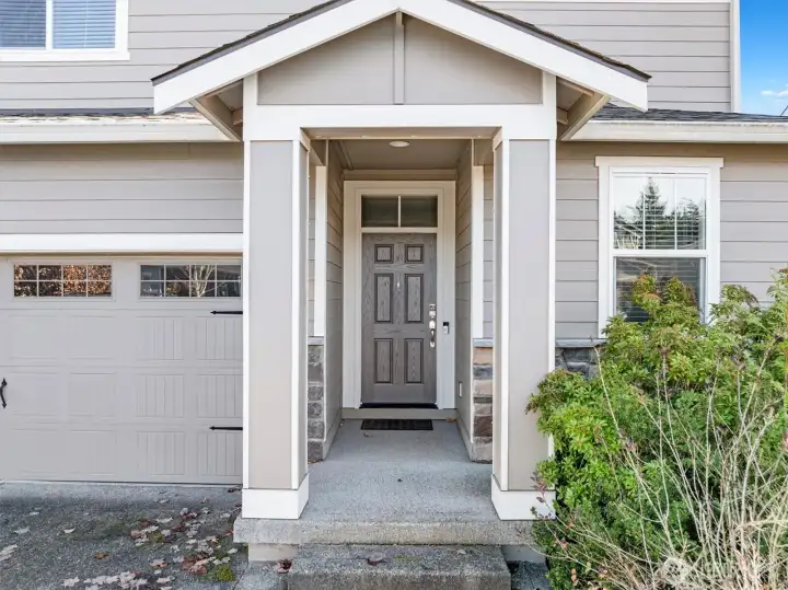 Inviting covered front porch welcomes you home