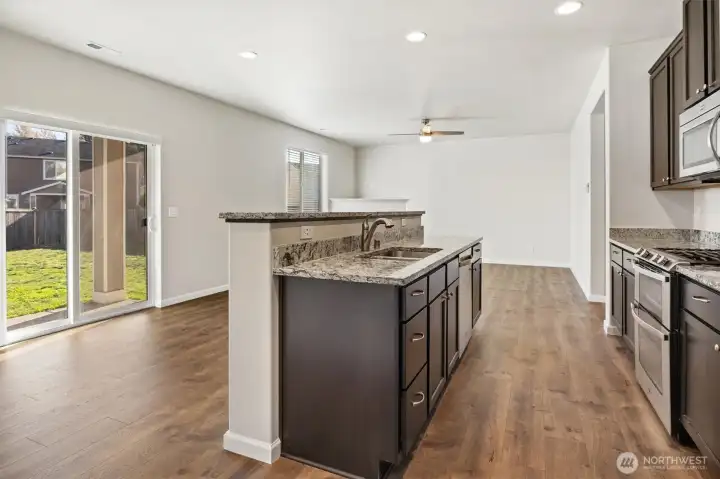 Seamless indoor-outdoor flow through backyard sliding doors