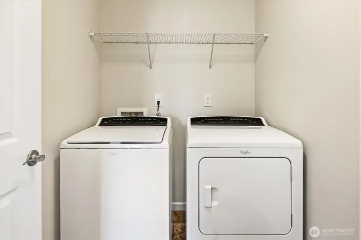 Laundry room with additional storage