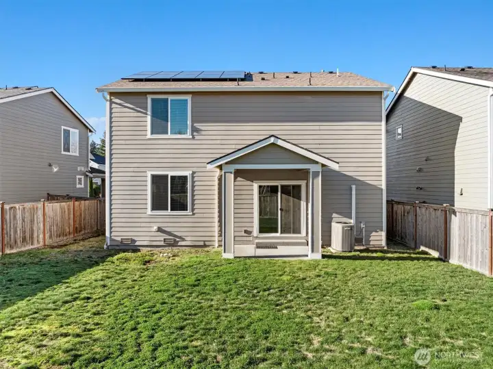 Enjoy outdoor cooking on the covered patio in any season