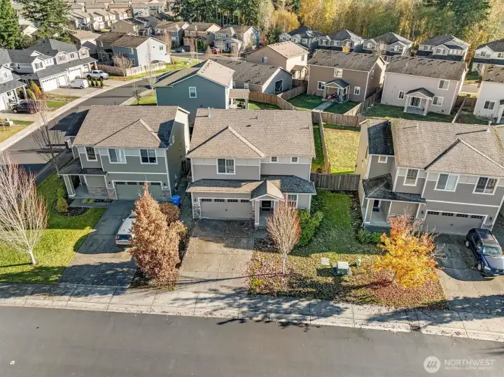 Overhead view showcasing mature landscaping with vibrant colors