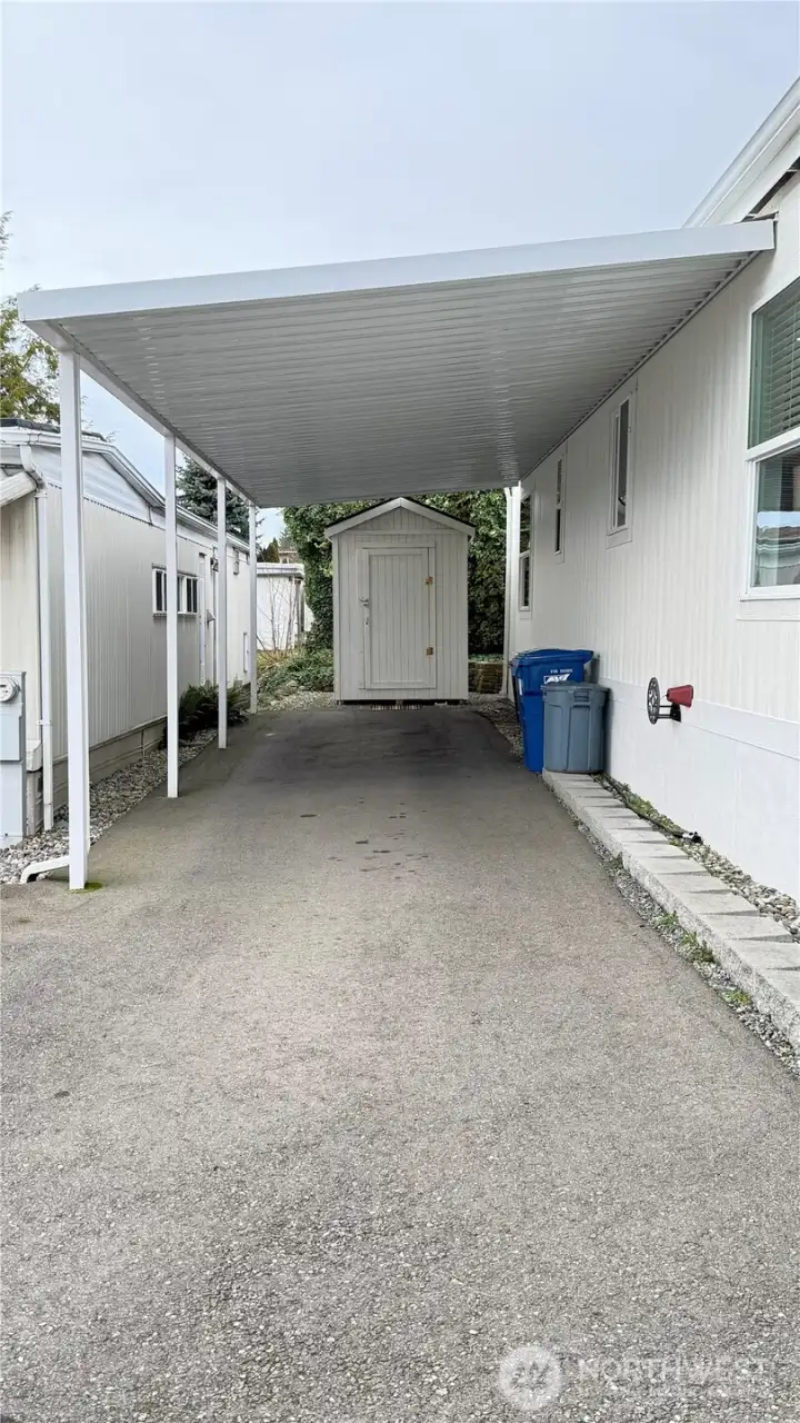 Enough space to park up to three small cars, and a spacious shed conveniently located at the end of the driveway.