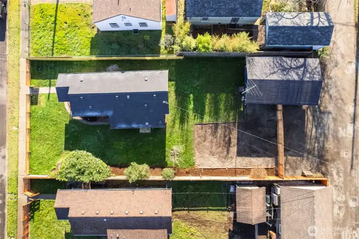 Rare two-lot property offering extra space, privacy, and excellent DADU or expansion potential.