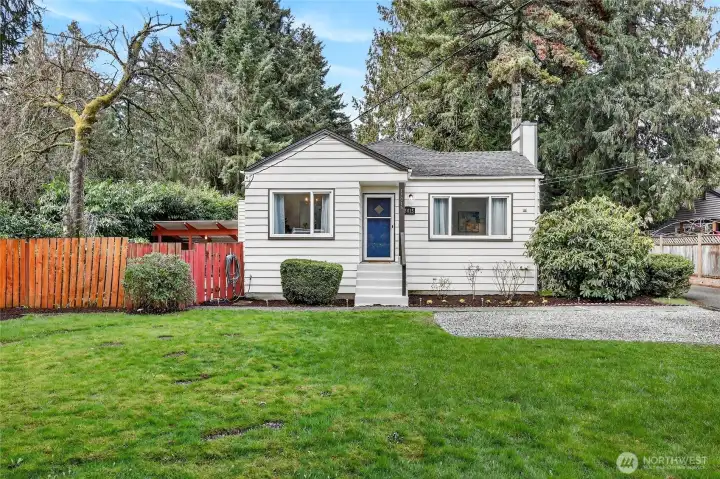 With a huge front yard, and private fully fenced backyard this home is an oasis, just across the street from a 205-Acre Park.