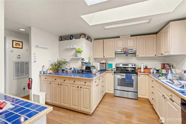 Unique Layout provides tons of cabinets and plenty of counter space!