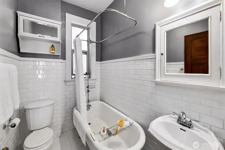 Classic deep claw footed tub and ample spaced bathroom